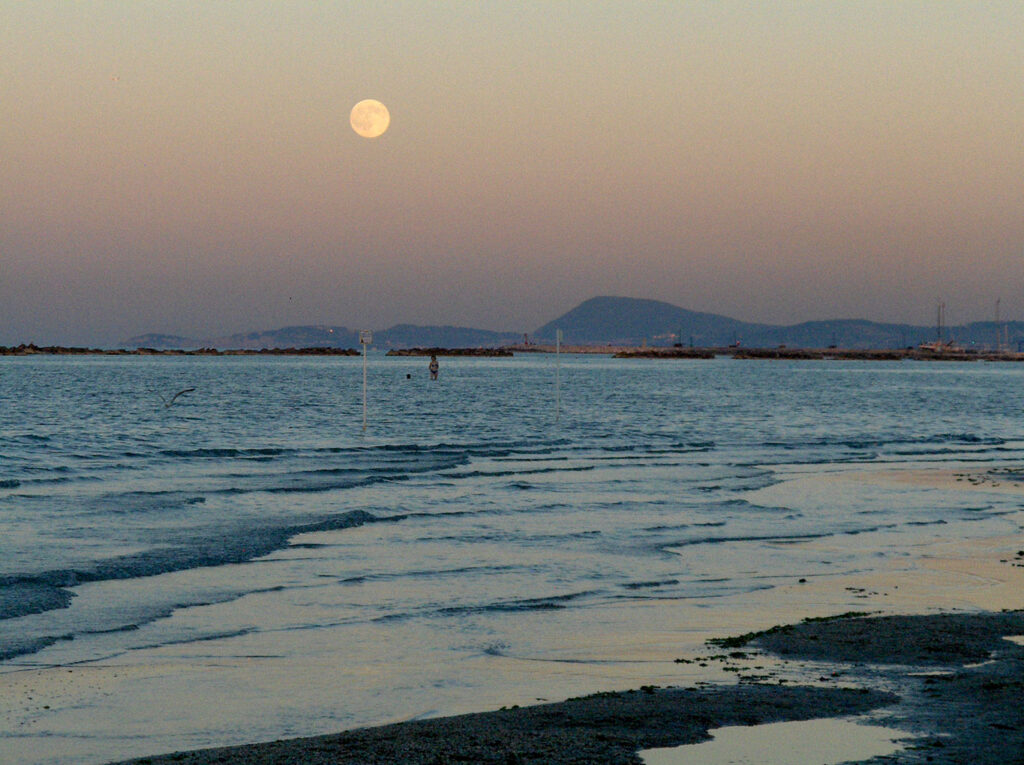 Sea at sunset and view of the Conero
